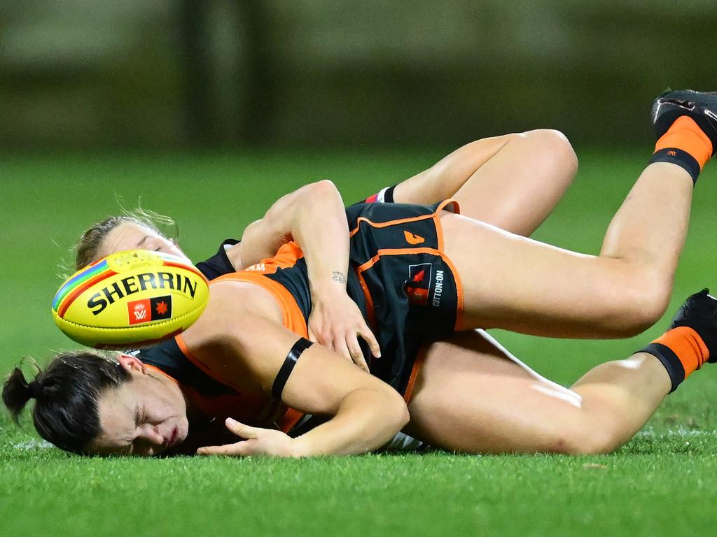 Lambert completes the tackle as Parker’s head hits the turf. Picture: Getty Images