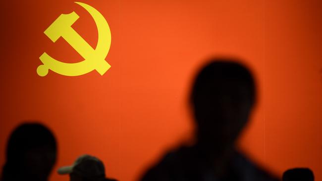 The party flag of the Chinese Communist Party displayed at an exhibition showcasing China's progress in the past five years at the Beijing Exhibition Centre. Picture: AFP