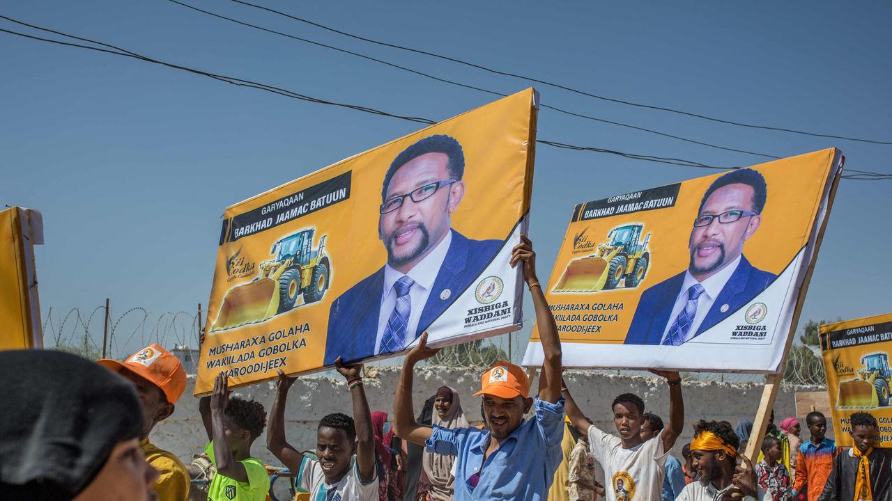 Supporters hold banners of candidates during a rally of the opposition Waddani Party for Somaliland’s elections. (Photo by Mustafa Saeed/AFP