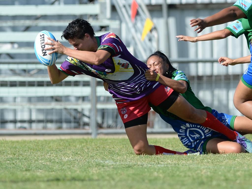 Nadine Hattingh about to ground the ball for a try while playing for Emu Park in the women’s grand final at the Warba Wangarunya Rugby League Carnival in Rockhampton.