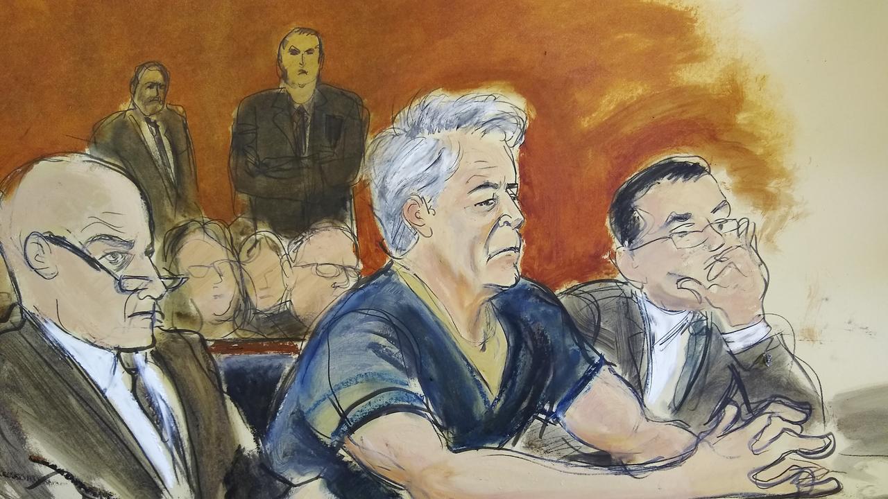 In this courtroom artist's sketch, defendant Jeffrey Epstein, centre, sits with attorneys Martin Weinberg, left, and Marc Fernich during his arraignment in New York federal court, Monday, July 8, 2019. Picture: Elizabeth Williams via AP