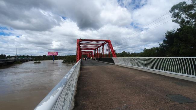 The swollen Logan River under the ‘Red Bridge’, Loganholme on Tuesday. Picture: Supplied