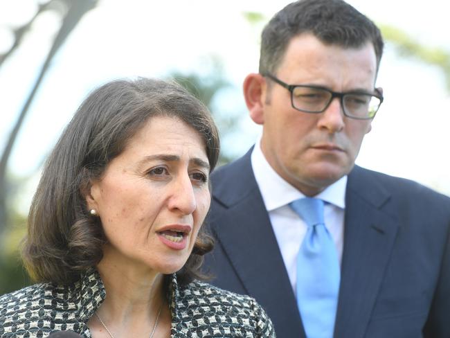 New South Wales Premier Gladys Berejiklian (left) and Victorian Premier Daniel Andrews (right) joined Australian Prime Minister Malcolm Turnbull (not pictured) after meeting with survivors of Institutional Child Sexual Abuse at Kirribilli House in Sydney, Friday, March 9, 2018. The Prime Minister and State Premier's announced that New South Wales and Victoria have joined the National redress scheme for Survivors of Institutional Child Sexual Abuse. (AAP Image/Dean Lewins) NO ARCHIVING