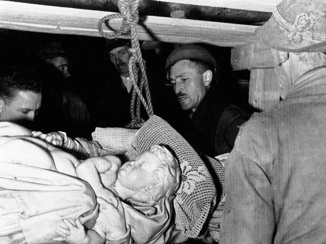 The Bruges Madonna and Child by Michelangelo being rescued from a salt mine in Austria in 1945. Public domain image.