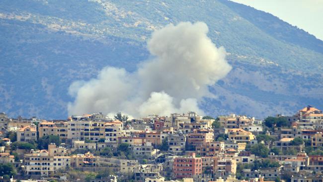 Smoke billows from the site of an Israeli airstrike in the southern Lebanese village of Khiam as war opens up on multiple fronts.