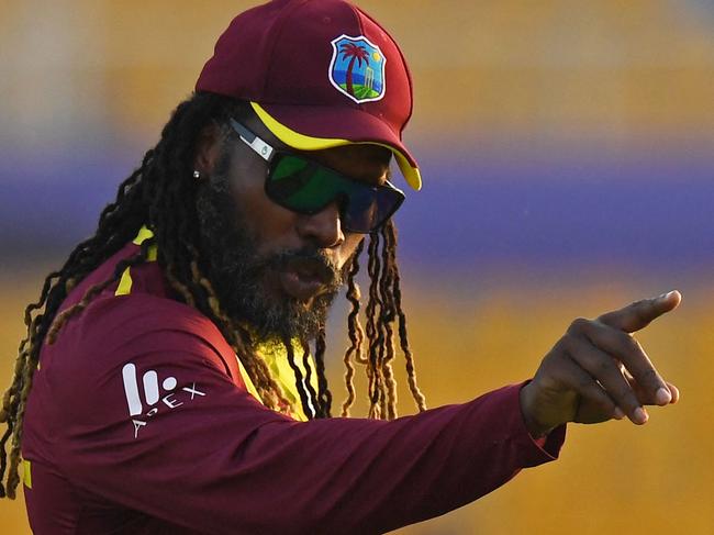 West Indies' Chris Gayle gestures during the ICC menâs Twenty20 World Cup cricket match between Australia and West Indies at the Sheikh Zayed Cricket Stadium in Abu Dhabi on November 6, 2021. (Photo by INDRANIL MUKHERJEE / AFP)