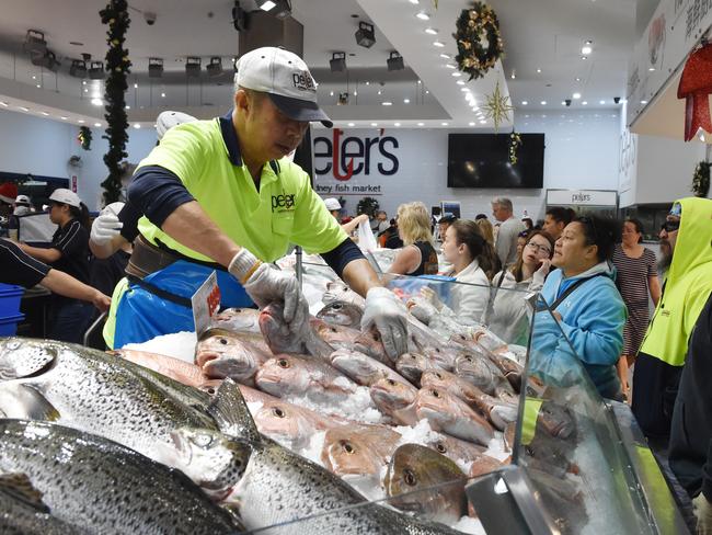 Customers are branching out to sashimi and sea urchins this year. Picture: Mick Tsikas 