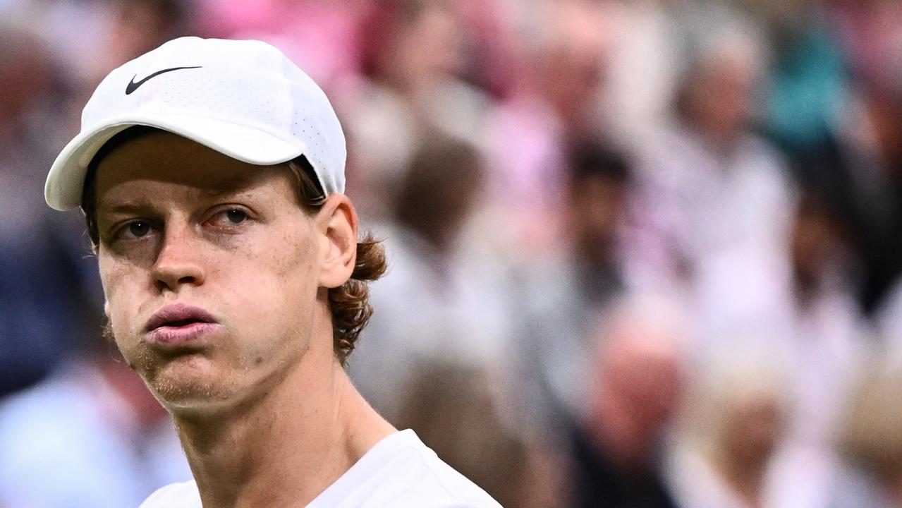 Italy's Jannik Sinner reacts as he plays against Novak Djokovic during their men's singles semi-finals tennis match. Picture: Sebastien Bozon/AFP