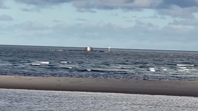 HMAS Dechaineux spotted off Golden Beach, near Caloundra, on April 4. Photo: Caloundra Coast Guard