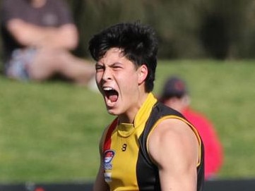 Josh Lai celebrates one of his two semi final goals this September. Picture: Andrew Keech.