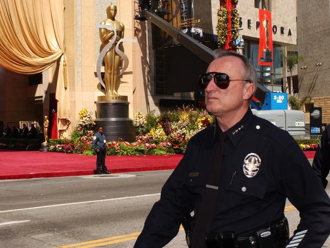 ONLINE ONLY Police patrol in front of the Kodak Theater. during Anti-War Activists Protest at The Academy Awards at The Streets of Hollywood in Hollywood, California, United States. (Photo by Bob Riha Jr/WireImage)