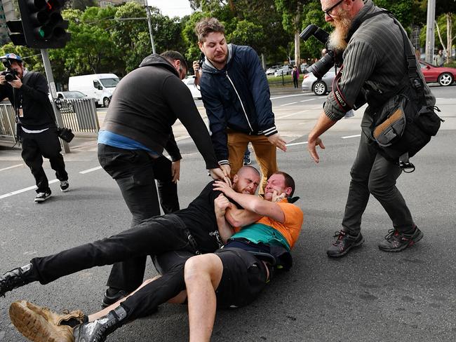 The controversial Alt Right figure spoke at the Melbourne Pavilion in Flemington. Protesters from opposing groups fight. Picture: Jake Nowakowski