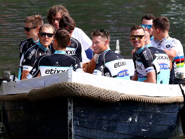 Tour de France - Team Presentations in Lepelenburg Park in Utrecht. Teams make their way up the canal through the park before being presented to the public. Australian Mark Renshaw (front of boat smiling) and his Etixx-Quickstep team mates get ready to be presented - Renshaw will be hoping to lead out Mark Cavendish to sprint victories. Photo Sarah Reed.