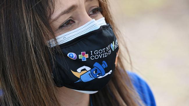 A healthcare worker at a community vaccination event at QueensCare Health Centre in a predominantly Latino neighbourhood of Los Angeles. Picture: AFP