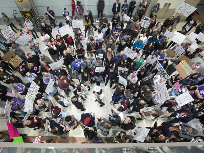 Demonstrators protest President Donald Trump's immigration order during a rally at McCarran International Airport in Las Vegas. Picture: AFP