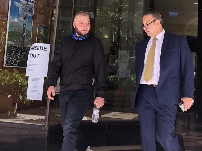 Mouhammad Zraika (left) leaves the Downing Centre after being fined $550 for the wild brawl.