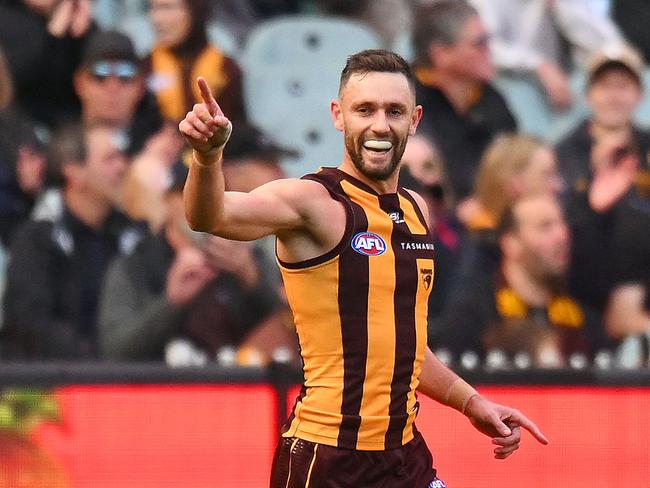 Jack Gunston of the Hawks celebrates a goal during the round 12 AFL match. (Photo by Morgan Hancock/AFL Photos/via Getty Images)