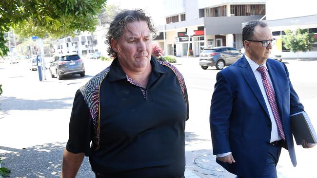 Justen Shawn Orford, 47, walks from the Townsville Watchhouse with defence lawyer Anderson Telford on July 30. Picture: Shae Beplate.