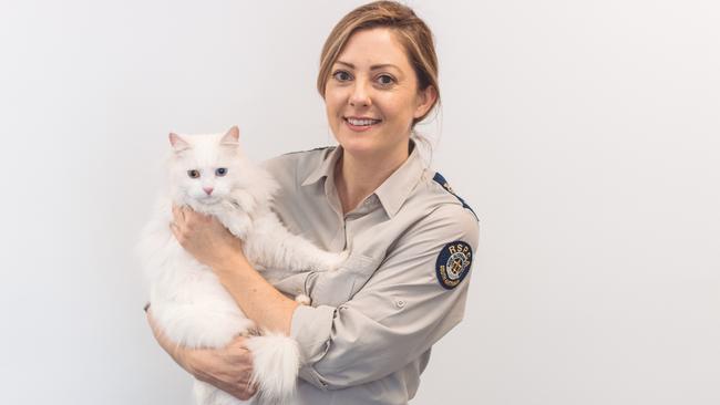 RSPCA Inspector Kristy Adams with Luna. Picture: Ryan Jiannis