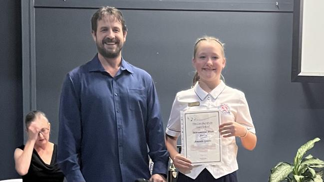 Instrumental Music Award - Amanda Geurts presented by Instrumental Music teacher Tim Berry, Tin Can Bay State School awards.