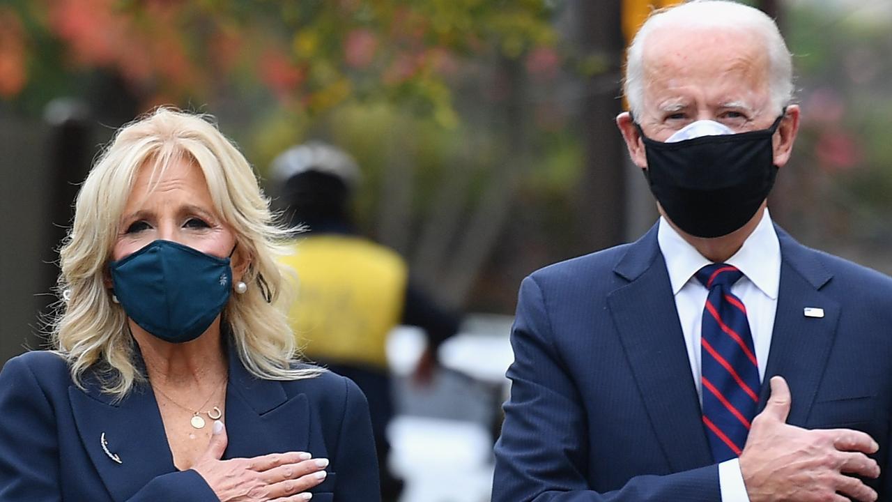 US President-elect Joe Biden and his wife Jill Biden pay their respects at a Veterans Day event. Picture: Angela Weiss/AFP