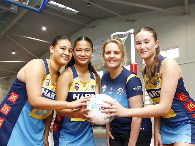 Titans netball players Roxanne Rhind, Madison Rhind, coach Erin Byrnes, and Jade Karadag at the TItans Netball Academy. Photo:Tertius Pickard