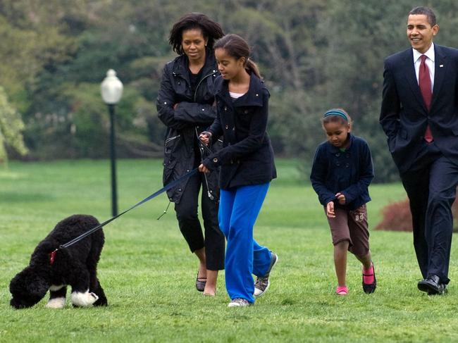 Malia Obama walking her six-month old Portuguese water dog Bo alongside former US President Barack Obama, Sasha Obama and former First Lady Michelle Obama on the South Lawn of the White House in Washington, DC in 2009. Picture: AFP/Saul Loeb