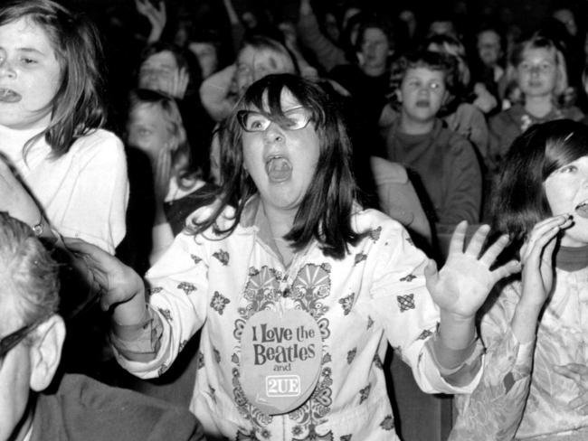 Music fan screaming at arrival of band The Beatles at Sydney Stadium during 1964 Australian tour 18 Jun 1964. 1960s fans