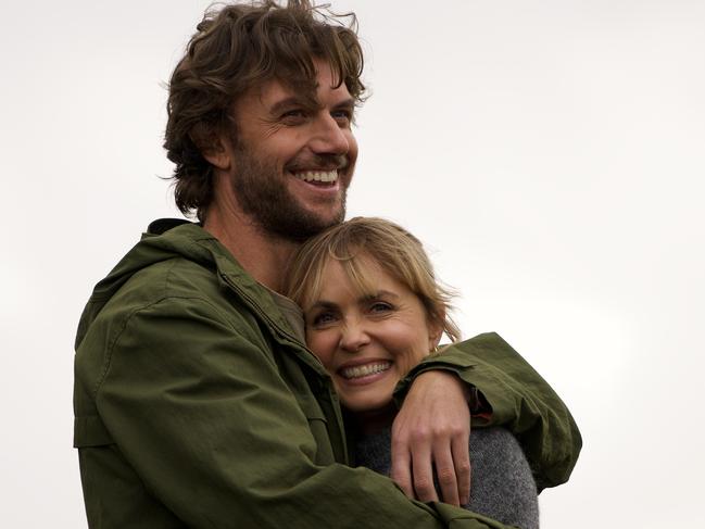 Adam Demos and Radha Mitchell in Take My Hand.