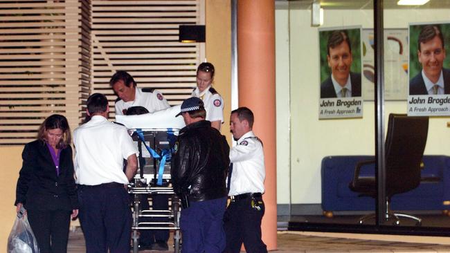 Paramedics take Brogden to hospital after he collapsed at his Mona Vale electoral office in Sydney.