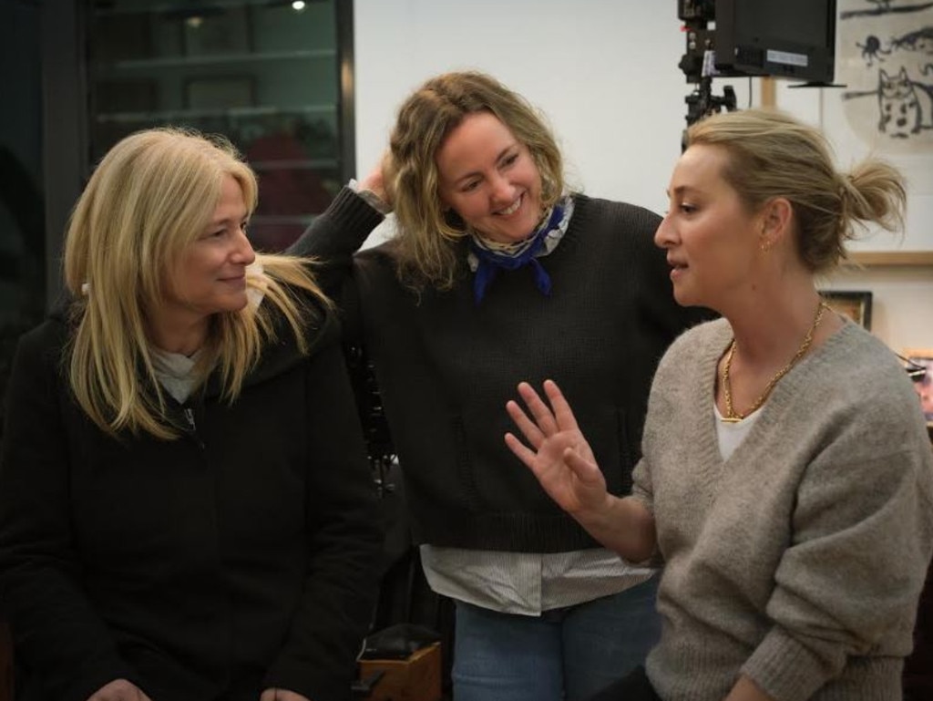 Keddie (right) with Strife producer Bruna Papandrea (left) and screenwriter Sarah Scheller (centre) on the set of Strife Season 2.