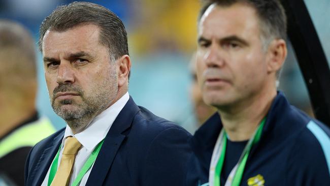 Ange Postecoglou looks on from the sidelines.