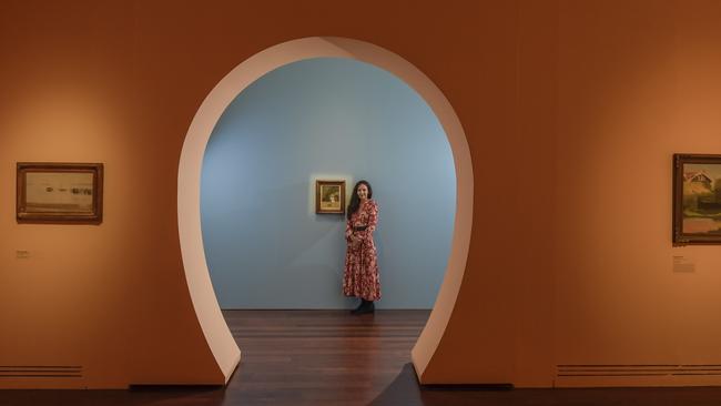 Art Gallery of South Australia curator Tracey Lock with the Clarice Beckett painting The Butterfly Catcher, which is included in an exhibition of Beckett’s work. Picture: Roy Van Der Vegt