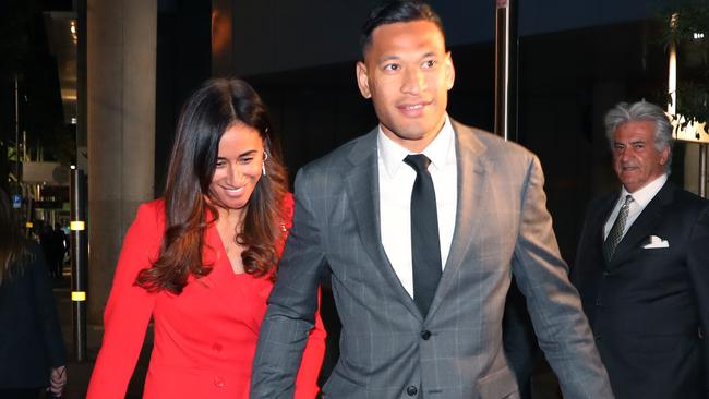 Israel Folau and wife Maria leave the Federal Circuit Court in Melbourne on Monday. Picture: AAP/David Crosling