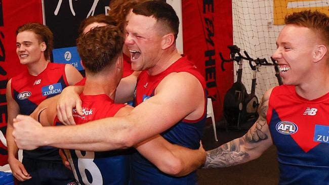 Jake Melksham and Steven May embrace after Melbourne’s win against Carlton. Picture: Michael Willson/AFL Photos