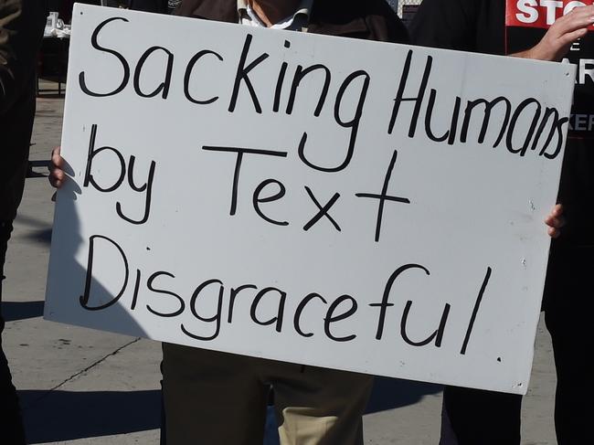 Sacked by text, workers have last laugh