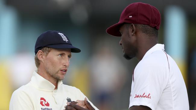 England's captain Joe Root and West Indies' captain Jason Holder shake hands. Picture: AP