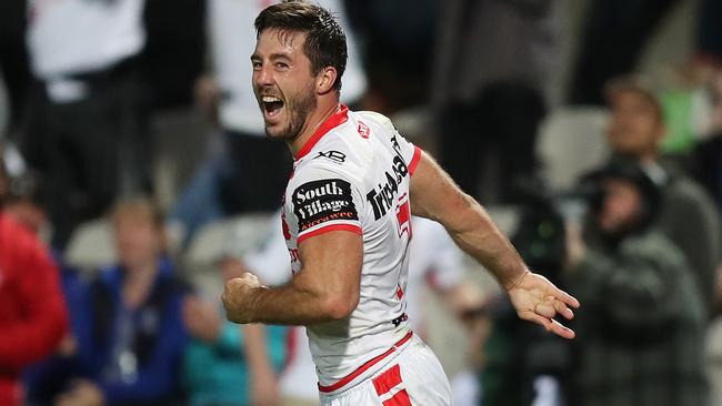 Ben Hunt celebrates after scoring his second try for the Dragons. Picture: Brett Costello