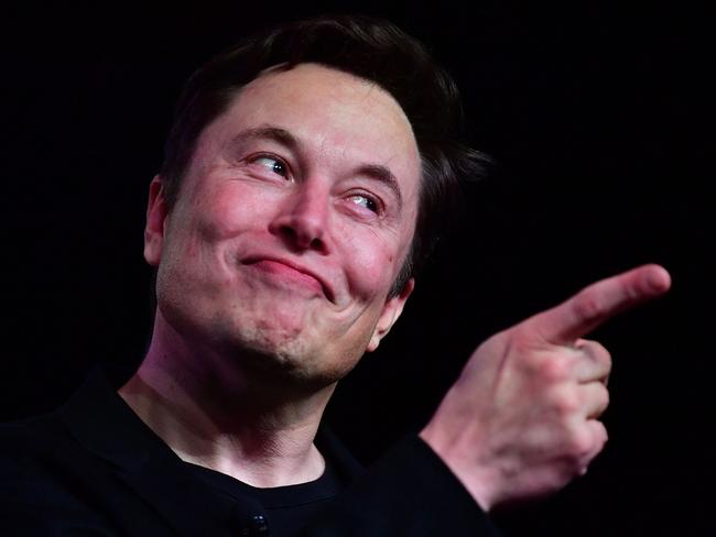 (FILES) In this file photo taken on March 14, 2019, Tesla CEO Elon Musk speaks during the unveiling of the new Tesla Model Y in Hawthorne, California. - Elon Musk's decision to pull Twitter off the stock market allows him to make major changes quickly, but it also takes the company more heavily into debt, a risky choice for a money-losing business. (Photo by Frederic J. BROWN / AFP)