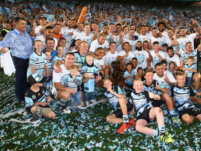 SYDNEY, AUSTRALIA - OCTOBER 02: The Sharks team pose for a team photo as they celebrate victory after the 2016 NRL Grand Final match between the Cronulla Sharks and the Melbourne Storm at ANZ Stadium on October 2, 2016 in Sydney, Australia. (Photo by Mark Kolbe/Getty Images)