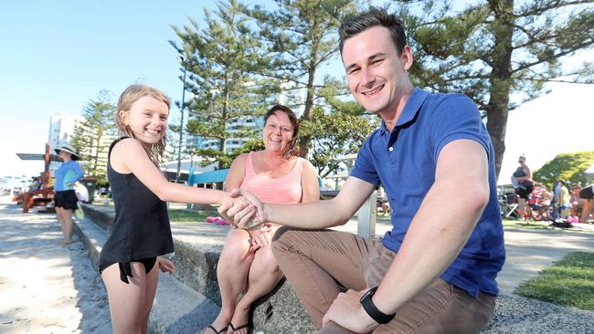 The LNP’s Sam O'Connor at Harley Park Labrador during the vote count. He met Hannah Renwick (9) who asked her mum to vote for him and was star struck when they bumped into each other at the park. Photo by Richard Gosling