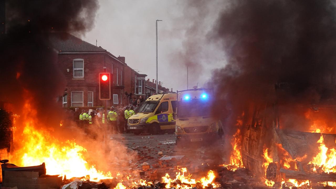 Police vans were set on fire as riot cops clashed with hundreds of protesters. Picture: Getty Images