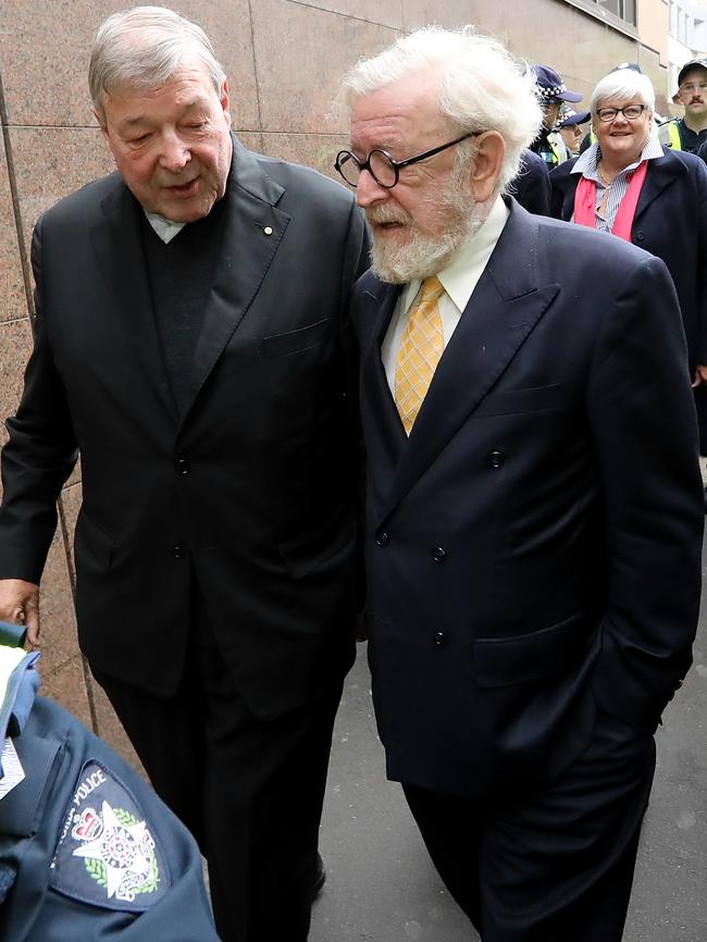 Cardinal George Pell and barrister Robert Richter, QC leave the Magistrates Court in Melbourne. Picture: Alex Coppel.