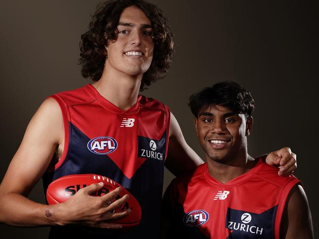 Luke Jackson and Kysaiah Pickett of the Melbourne Demons pose for a photograph during the first round of the 2019 AFL Draft at Marvel Stadium in Melbourne, Wednesday, November 27, 2019. (AAP Image/Scott Barbour) NO ARCHIVING