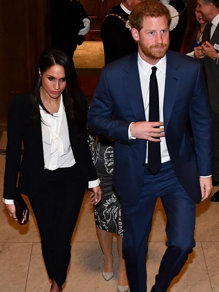 Meghan went for a designer tuxedo. Picture: AFP PHOTO/Ben STANSALL