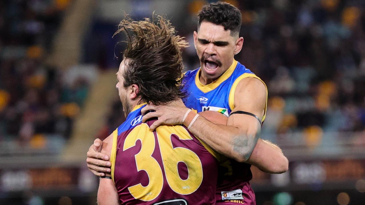 Rhys Mathieson and Charlie Cameron celebrate the win over Gold Coast. Picture: Russell Freeman