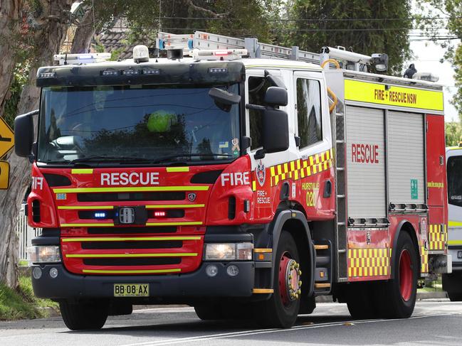 SYDNEY, AUSTRALIA - NewsWire Photos February 10, 2021: A house fire at 87 Quigg Street in Lakemba today has gutted the building and filled the streets with smoke. Picture: NCA NewsWire / David Swift
