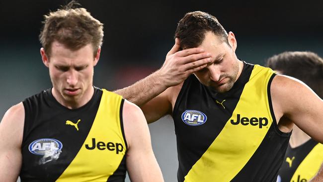 MELBOURNE, AUSTRALIA - JULY 25: Dylan Grimes and Toby Nankervis of the Tigers  look dejected after losing the round 19 AFL match between Geelong Cats and Richmond Tigers at Melbourne Cricket Ground on July 25, 2021 in Melbourne, Australia. (Photo by Quinn Rooney/Getty Images)