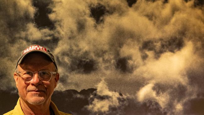 Artist Richard Butler in front of one his stunning photographs, featuring the extraordinary cloudscapes of the Northern Midlands. Picture: Robert Heazlewood