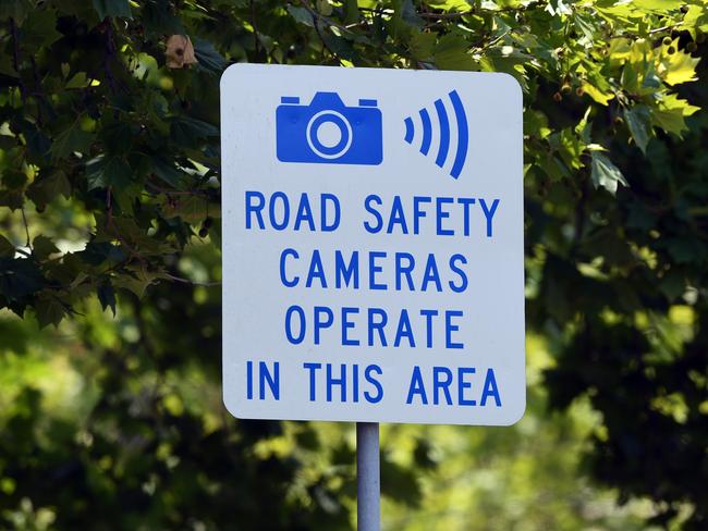 A "road saftey cameras operate in this area" sign is seen in Melbourne, Friday, December 27, 2019. The state government has released traffic camera statistics for the financial year 2018-19. The corner of King and Latrobe Streets in the CBD camera caught 38,705 motorists, the most in Victoria. (AAP Image/Julian Smith) NO ARCHIVING